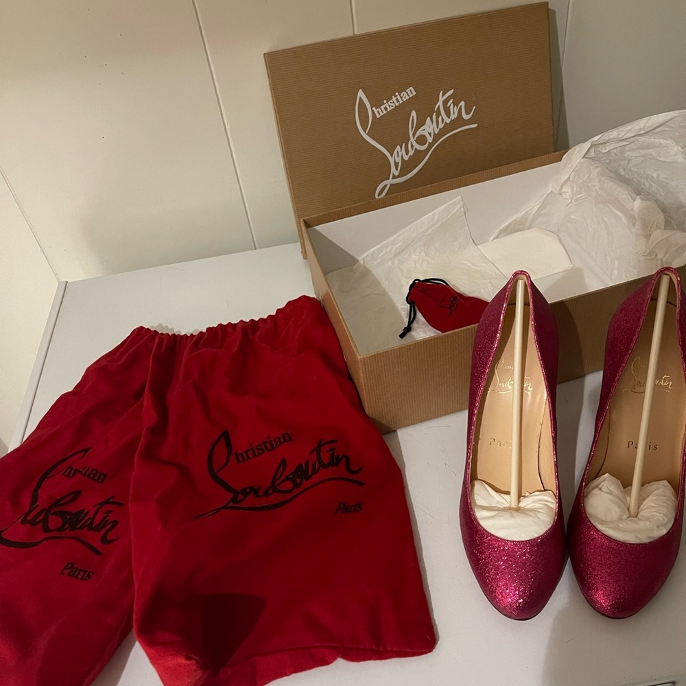 Womens Louboutin pink glitter pumps